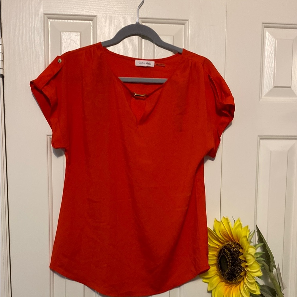 Calvin Klein blouse orange color very stylish Sz M.